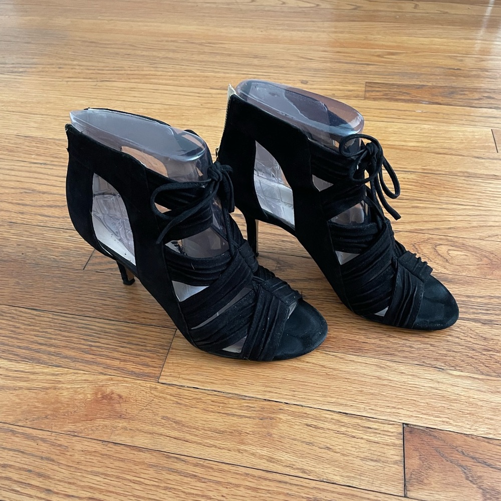 Nine West, leather upper, strappy heels with back zipper.
